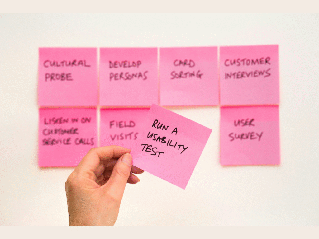 plan of the webiste design on sticky notes 